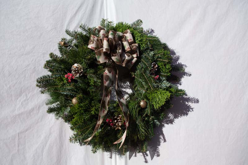 Fresh Handmade Circular Wreaths with Pine Cone Ribbon